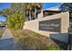 Sign reading 'North Bay Village Condominiums' with palm trees in background at 6330 Newtown Cir # 30B4, Tampa, FL 33615
