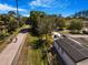 Aerial view of the home with solar panels, and the neighboring bike path at 7101 8Th N Ave, St Petersburg, FL 33710