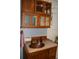 Bathroom vanity with rustic-style vessel sink and wooden cabinets at 7101 8Th N Ave, St Petersburg, FL 33710