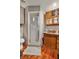 This is a bathroom featuring wood cabinets, sink, and a walk-in shower at 7101 8Th N Ave, St Petersburg, FL 33710