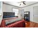 This bedroom features hardwood floors and a padded headboard at 7101 8Th N Ave, St Petersburg, FL 33710