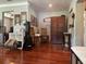 Spacious room with hardwood floors, a telescope, and stylish decor at 7101 8Th N Ave, St Petersburg, FL 33710