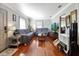 Bright living room with hardwood flooring, comfortable seating, and neutral wall colors at 7101 8Th N Ave, St Petersburg, FL 33710