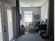 Office space features door to exterior, window, desk, and storage at 7101 8Th N Ave, St Petersburg, FL 33710
