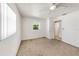Bedroom featuring a window and neutral carpet at 1137 54Th S Ave, St Petersburg, FL 33705