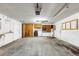 Large garage with laundry area, utility sink, and storage cabinets at 1137 54Th S Ave, St Petersburg, FL 33705