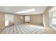 Bright, open living room features a skylight, and neutral color palette at 1137 54Th S Ave, St Petersburg, FL 33705