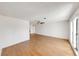 Generous living room area with sleek wood floors and neutral wall color at 1137 54Th S Ave, St Petersburg, FL 33705