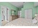 Bedroom view of a wardrobe and open bathroom at 1489 Ridge Shore Dr, Tarpon Springs, FL 34689