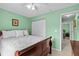 Cozy bedroom featuring a white closet and a wooden bed at 1489 Ridge Shore Dr, Tarpon Springs, FL 34689