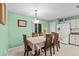 This dining room features tile floors and a stylish light fixture at 1489 Ridge Shore Dr, Tarpon Springs, FL 34689
