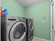 Modern laundry room equipped with LG washer and dryer at 1489 Ridge Shore Dr, Tarpon Springs, FL 34689