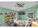 Cozy living area with sliding glass doors, tile flooring, and an open feel at 1489 Ridge Shore Dr, Tarpon Springs, FL 34689