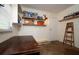 Storage room with workbench and shelves at 1503 Council Dr, Sun City Center, FL 33573