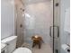 Modern bathroom with a glass-enclosed shower and a sleek design at 1719 Belleair Forest Dr # B, Belleair, FL 33756