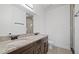 Elegant bathroom with double sinks, granite countertops, and a glass-enclosed shower at 1910 W North A St # 5, Tampa, FL 33606