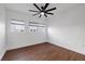 Bedroom featuring wood floors, ceiling fan and natural light at 1910 W North A St # 5, Tampa, FL 33606