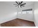 A modern bedroom with wood-look flooring and a ceiling fan at 1910 W North A St # 5, Tampa, FL 33606