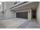Exterior garage view of a contemporary condo, featuring modern architectural details at 1910 W North A St # 5, Tampa, FL 33606