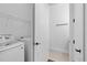 Bright laundry room with modern machines and storage space at 1910 W North A St # 5, Tampa, FL 33606