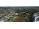 Expansive aerial view of a residential area with multiple bodies of water and lush greenery surrounding the homes at 201 79Th Ne Ave, St Petersburg, FL 33702