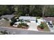 Charming home boasting waterfront access, a private boat dock, and meticulously maintained landscaping at 201 79Th Ne Ave, St Petersburg, FL 33702