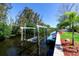 This property includes a private boat lift providing easy access to the water for boating and water activities at 201 79Th Ne Ave, St Petersburg, FL 33702