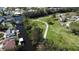 Aerial shot showcases a picturesque park along the waterway, with homes and community spaces at 201 79Th Ne Ave, St Petersburg, FL 33702