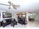 Comfortable living room with cozy seating, flowing seamlessly into the kitchen and dining areas at 201 79Th Ne Ave, St Petersburg, FL 33702
