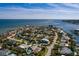 Waterfront community features mature trees and landscaping, and multiple homes with private boat docks at 2340 W Bay Isle Se Dr, St Petersburg, FL 33705