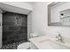 Stylish bathroom featuring a tiled walk-in shower, modern vanity, and sleek fixtures for a spa-like experience at 2710 W Osborne Ave # 1, Tampa, FL 33614