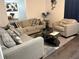 Cozy living room featuring comfortable seating and a stylish coffee table on dark wood flooring at 2710 W Osborne Ave # 1, Tampa, FL 33614