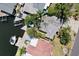 Birds eye view of property showing boat dock with waterfront access at 300 Westwinds Dr, Palm Harbor, FL 34683