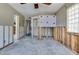 Bedroom with unfinished walls and floors, awaiting remodeling and design ideas at 300 Westwinds Dr, Palm Harbor, FL 34683