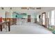 Partially renovated living area with natural light and open floor plan at 300 Westwinds Dr, Palm Harbor, FL 34683