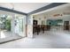 Partially renovated living area with access to backyard and open floor plan at 300 Westwinds Dr, Palm Harbor, FL 34683