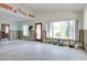 Partially renovated living area with natural light and open floor plan at 300 Westwinds Dr, Palm Harbor, FL 34683