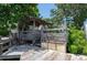 Waterfront property with rustic wooden bar and dock, creating an idyllic outdoor space for relaxation at 300 Westwinds Dr, Palm Harbor, FL 34683