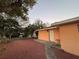 Charming backyard with brick pavers, a single door and a small table at 3111 W Spruce St, Tampa, FL 33607
