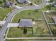 Overhead drone shot of a landscaped backyard with a white fence in a cul-de-sac at 3303 Ranchdale Dr, Plant City, FL 33566