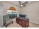 Office space with desk in front of a window and a comfortable chair, great for working from home at 3303 Ranchdale Dr, Plant City, FL 33566