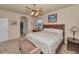 Spacious bedroom with a cozy bed, fan and furniture offering a relaxing atmosphere at 3303 Ranchdale Dr, Plant City, FL 33566