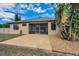 The home's exterior showcases a screened-in patio and a well-maintained backyard at 3303 Ranchdale Dr, Plant City, FL 33566