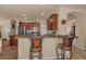 Well-appointed kitchen features a breakfast bar, stainless appliances, and ample counter space for cooking at 3303 Ranchdale Dr, Plant City, FL 33566