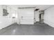 Open basement with concrete floors and white walls at 3553 34Th N Ave, St Petersburg, FL 33713