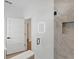 Walk-in shower view with tile surround and glass door, open to the ensuite bath at 3902 E Henry Ave, Tampa, FL 33610