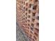 The unique brickwork on the exterior wall creates a textured visual pattern at 3906 Versailles Dr, Tampa, FL 33634