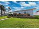Beautiful single-story house with mature landscaping and a well-kept lawn in a desirable location at 3906 Versailles Dr, Tampa, FL 33634