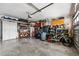 Organized garage space with storage cabinets and room for multiple vehicles at 3906 Versailles Dr, Tampa, FL 33634