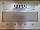 An antique, vintage radio speaker with labeled buttons at 3906 Versailles Dr, Tampa, FL 33634